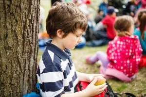 boy-sitting-by-himself-300x200.jpg