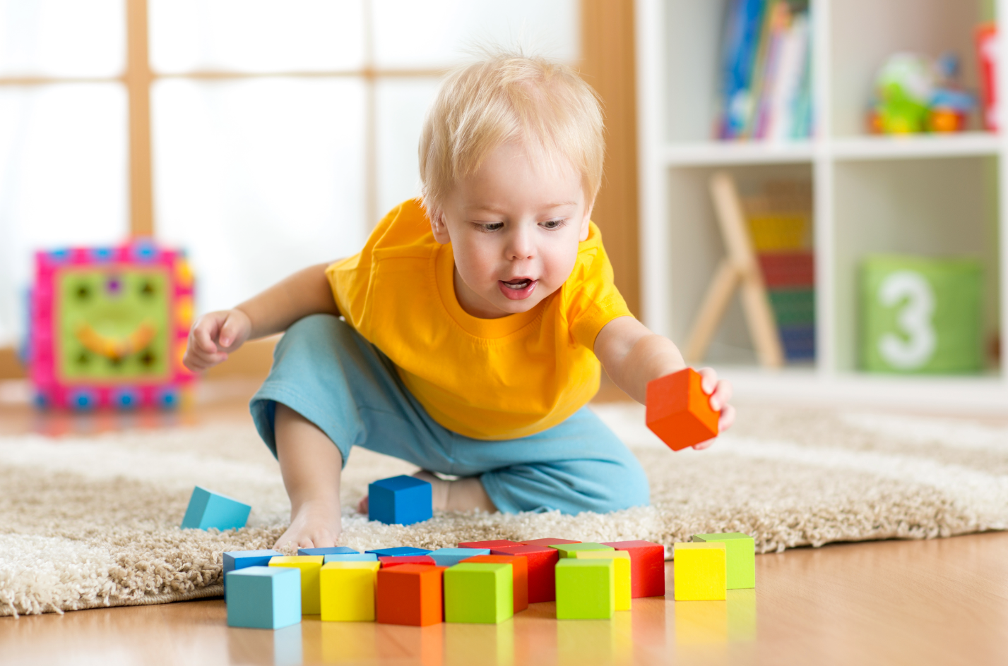 Child-playing-with-blocks--e1730923949193.png